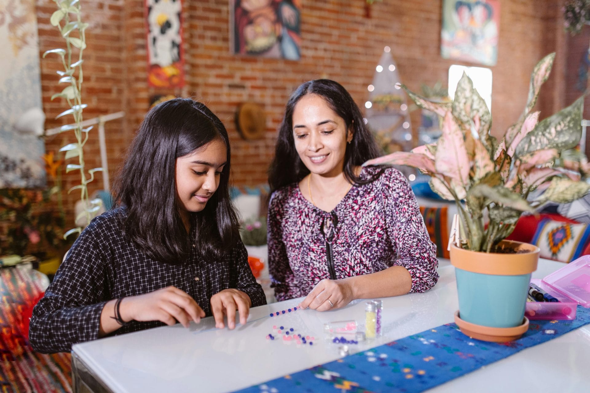 Girls talking on table
